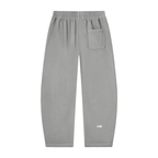 Light gray sweatpants with an elastic waistband, a side pocket on the right leg, and a small white logo near the lower left leg, shown against a plain white background.