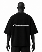 A black short-sleeve t-shirt with a white 'revivalathletic' logo printed across the back, displayed on a black mannequin against a white background.