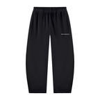 Black athletic jogger pants with an elastic waistband and a small white embroidered logo on the left hip, shown against a plain white background.