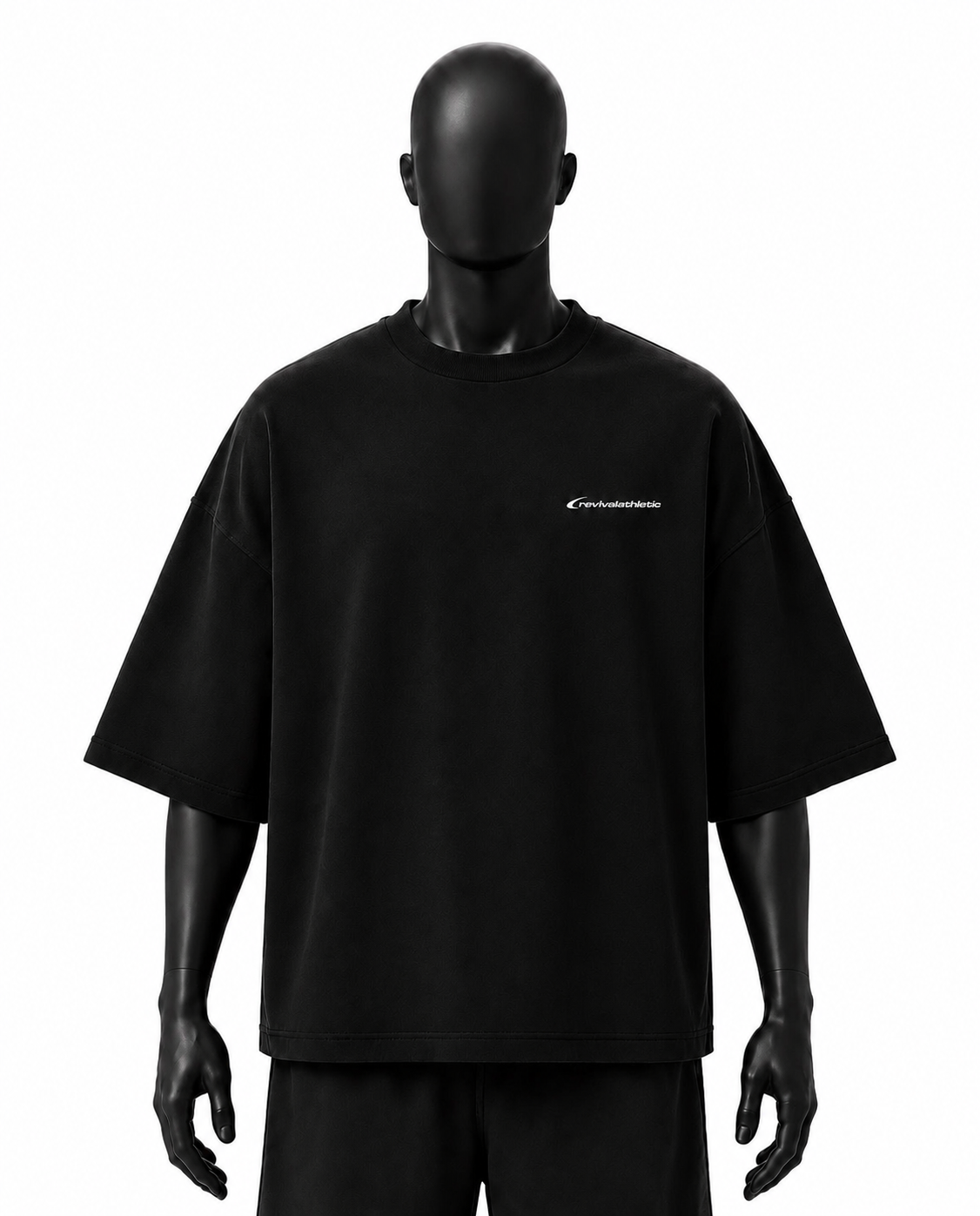 A black oversized short-sleeve t-shirt displayed on a matte black mannequin against a plain white background. The shirt features a small white script logo on the left chest.