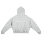A light heather gray cropped hoodie shown from the back, featuring the brand name 'REVIVALATHLETIC' printed in white across the upper back.