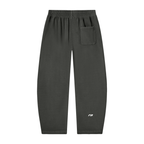 Dark gray sweatpants with an elastic waistband, a side pocket, and a small white logo near the lower left leg, shown against a plain white background.