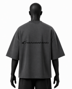 A dark gray short-sleeve t-shirt with a black 'revivalathletic' logo printed across the back, displayed on a black mannequin against a white background.