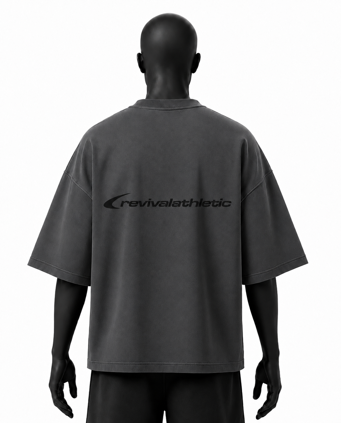A dark gray short-sleeve t-shirt with a black 'revivalathletic' logo printed across the back, displayed on a black mannequin against a white background.