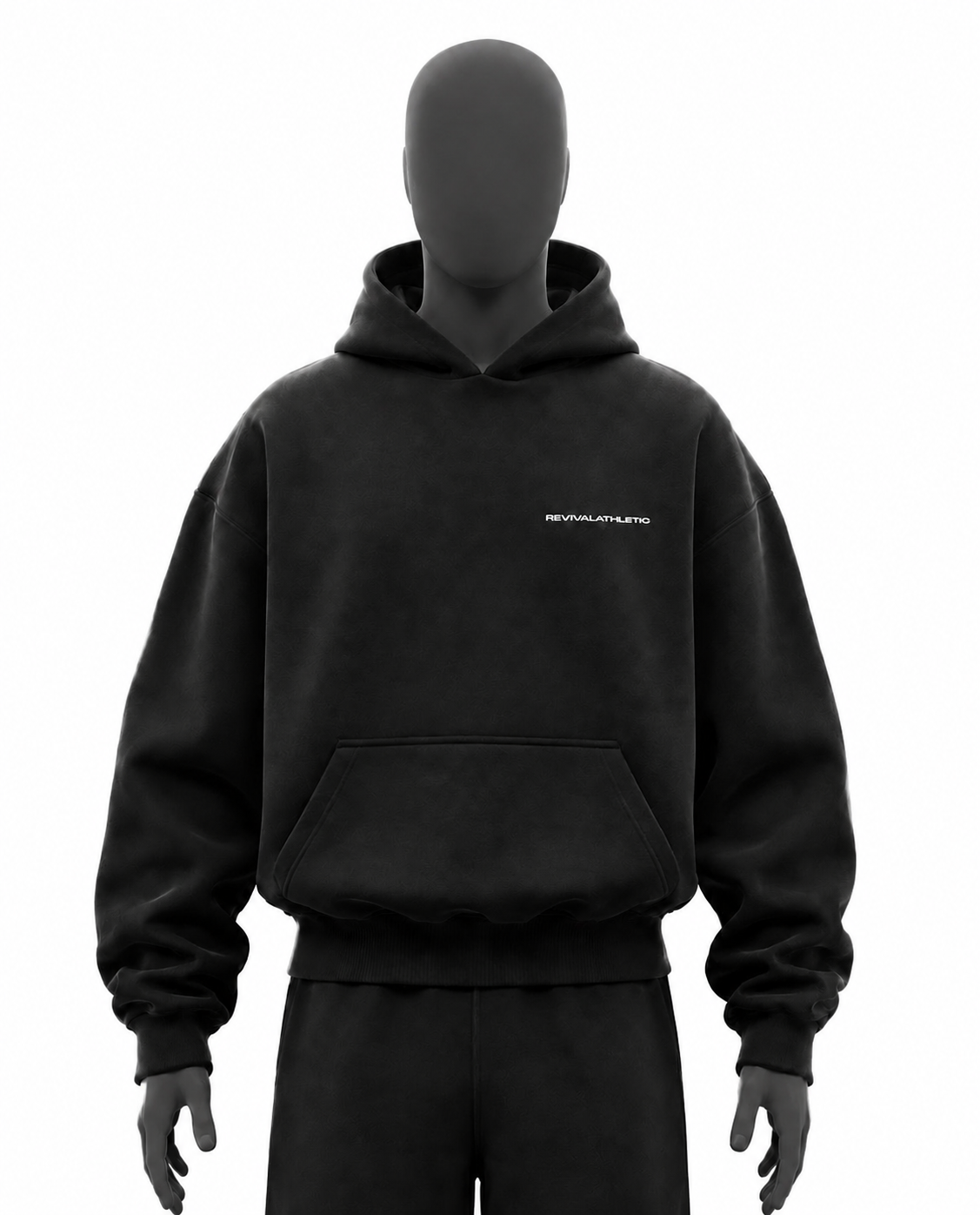 A black pullover hoodie displayed on a matte black mannequin torso, featuring a small white text logo on the left chest that reads REVIVALATHLETIC. The hoodie has a front kangaroo pocket and ribbed cuffs and hem, shown against a solid white background.