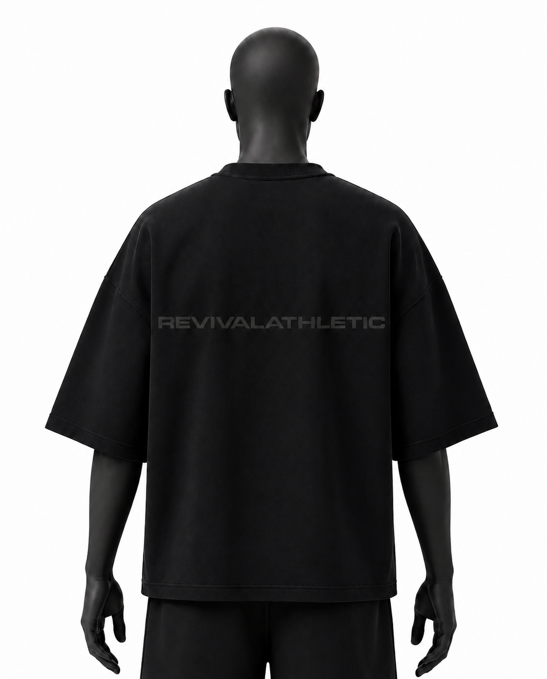 A black short-sleeve t-shirt shown from the back on a black mannequin, featuring the brand name 'REVIVALATHLETIC' printed in a subtle dark gray across the upper back.