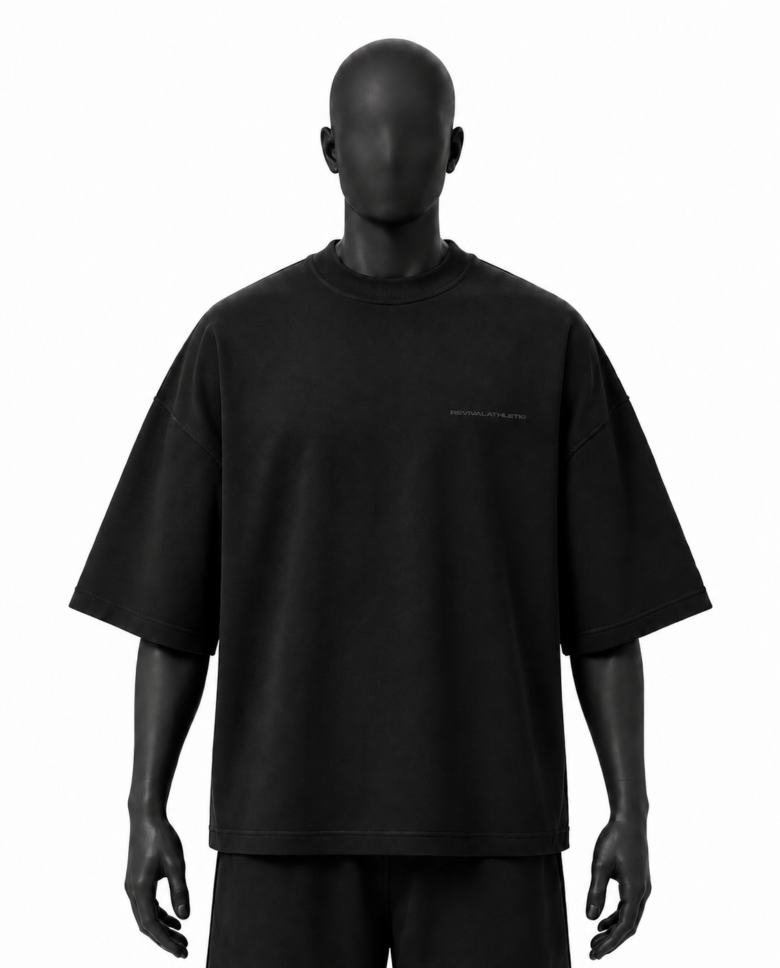 A black oversized short-sleeve t-shirt displayed on a matte black mannequin against a plain white background.