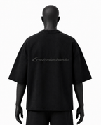 A black short-sleeve t-shirt shown from the back on a black mannequin, featuring a subtle dark gray 'revivalathletic' logo across the upper back.