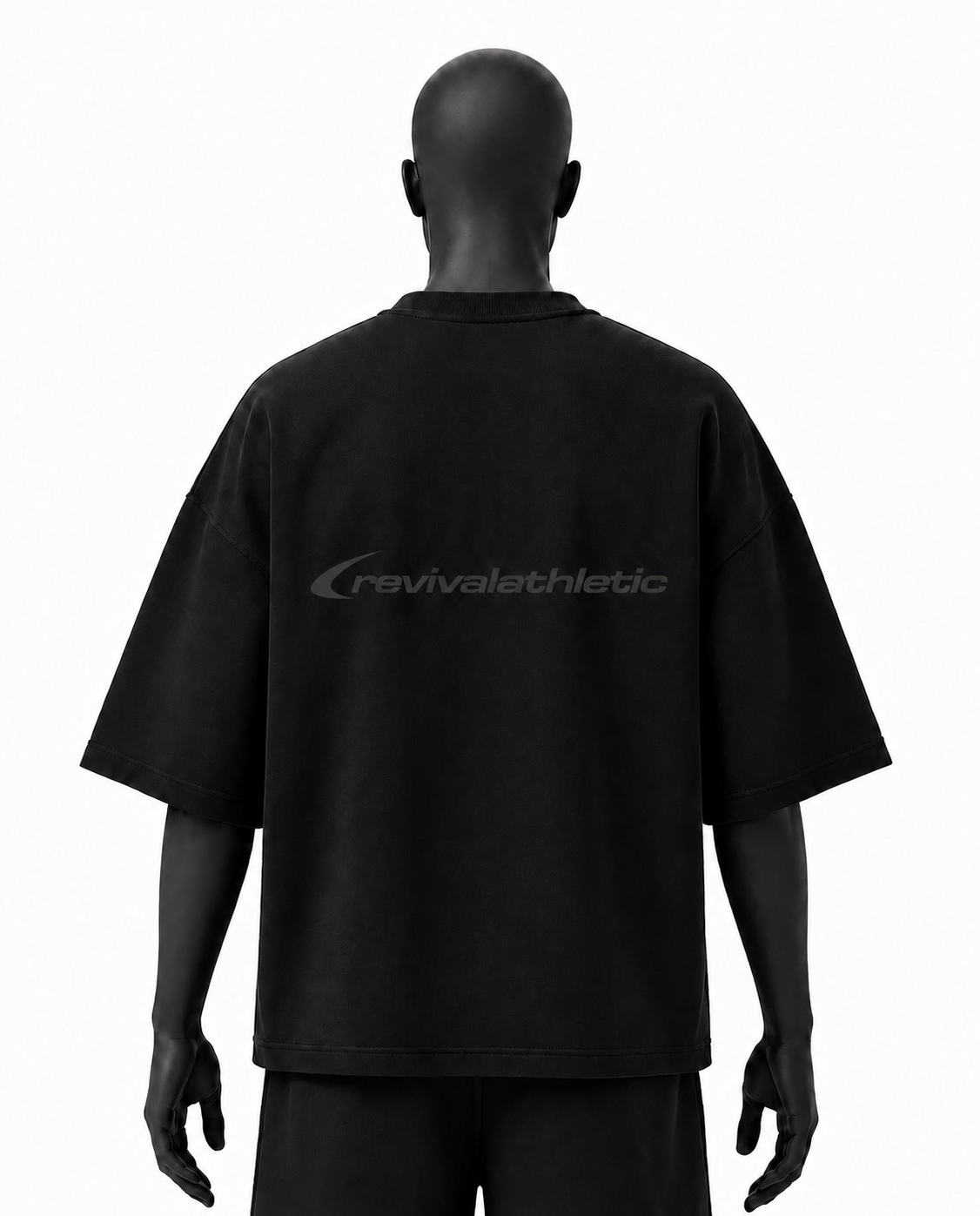 A black short-sleeve t-shirt shown from the back on a black mannequin, featuring a subtle dark gray 'revivalathletic' logo across the upper back.