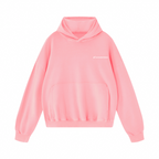 A light pink pullover hoodie with a small white script logo on the left chest, displayed on a clean white background.