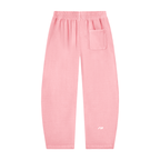 Light pink sweatpants with an elastic waistband, a side pocket on the right leg, and a small white logo near the lower left leg, shown against a plain white background.
