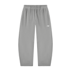 Light gray fleece jogger pants with an elastic waistband and a small white stylized logo on the left hip, shown flat against a white background.