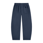 A pair of dark navy blue lounge pants with an elastic waistband and a side pocket, shown flat against a plain white background.
